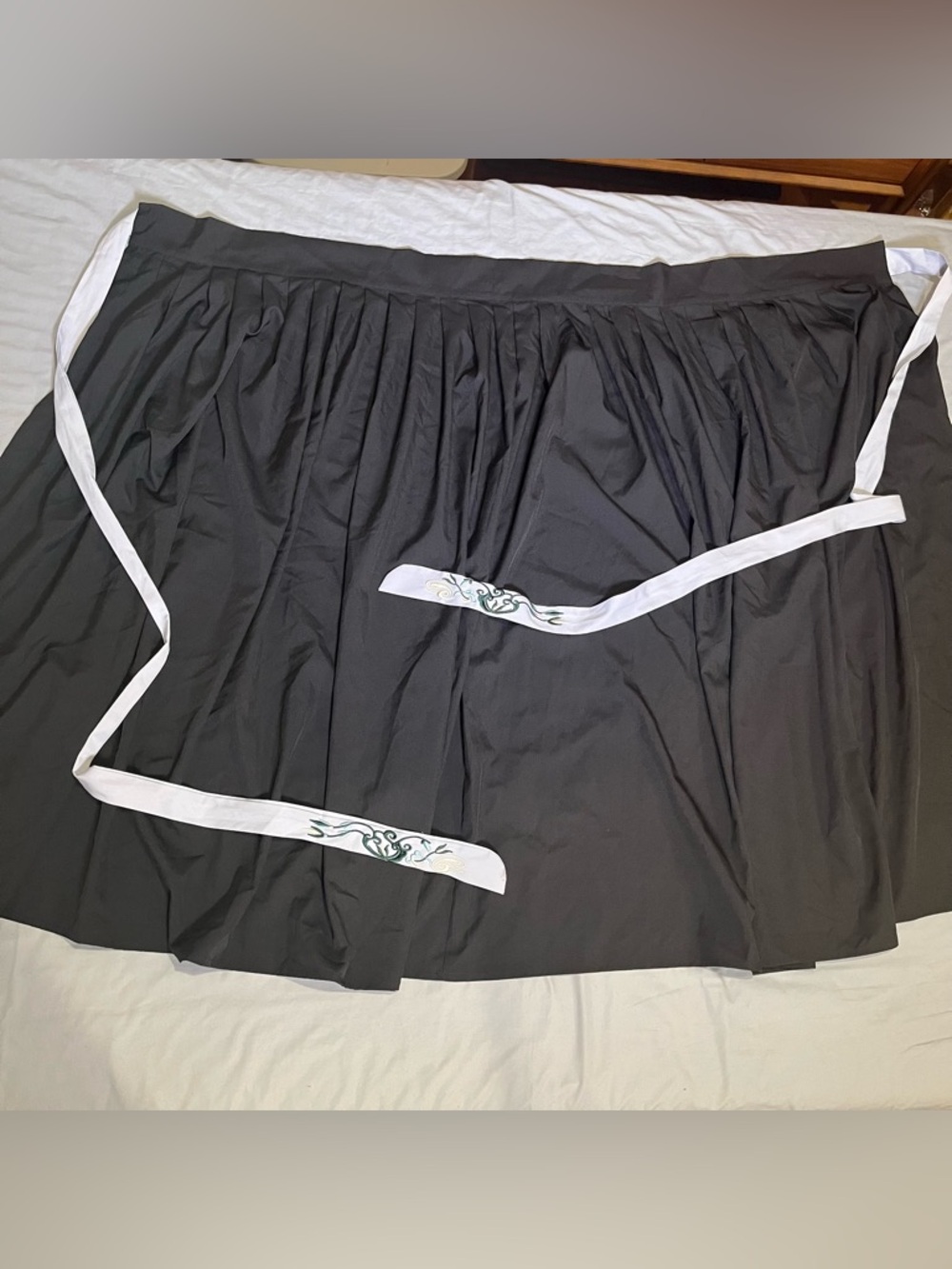 Plain black pleated Chinese hanfu skirt with embroidered ties